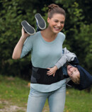 Woman with child wearing JuzoPro Lumbal Xtec Plus 