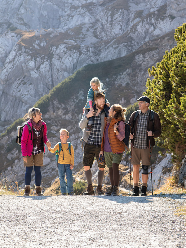 A family is out walking in the mountains
