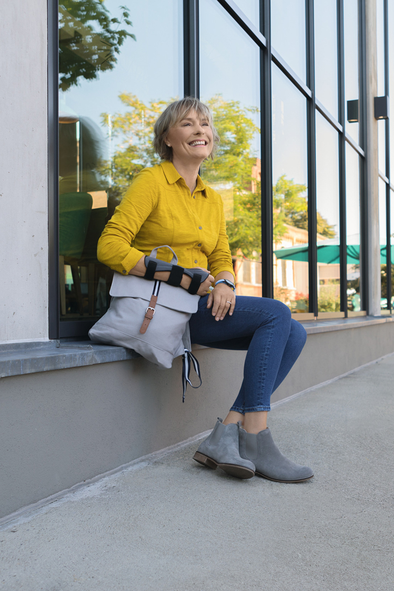 A woman is wearing a wrist brace